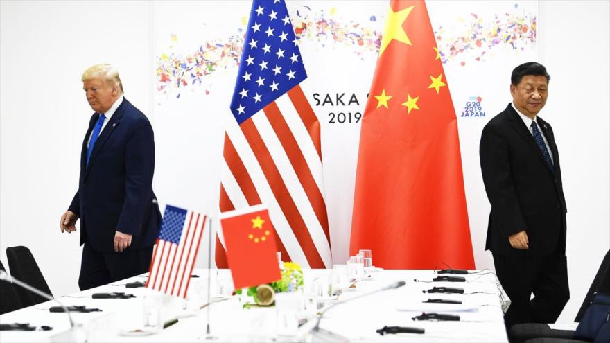 El presidente de EE.UU., Donald Trump (izq.), y su par chino, Xi Jinping, en la Cumbre del G20 en Osaka (Japón), 29 de junio de 2019.
