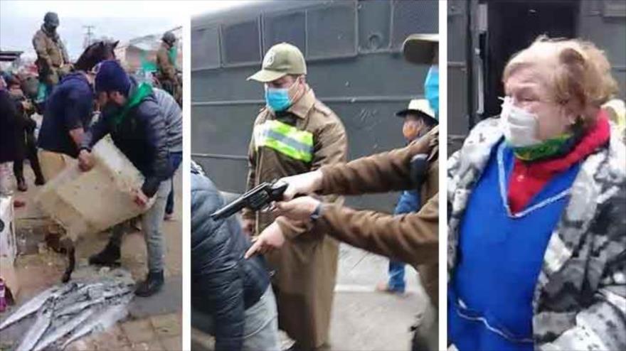 Vídeo: Carabinero apunta con revolver a anciana vendedora de pescado | HISPANTV