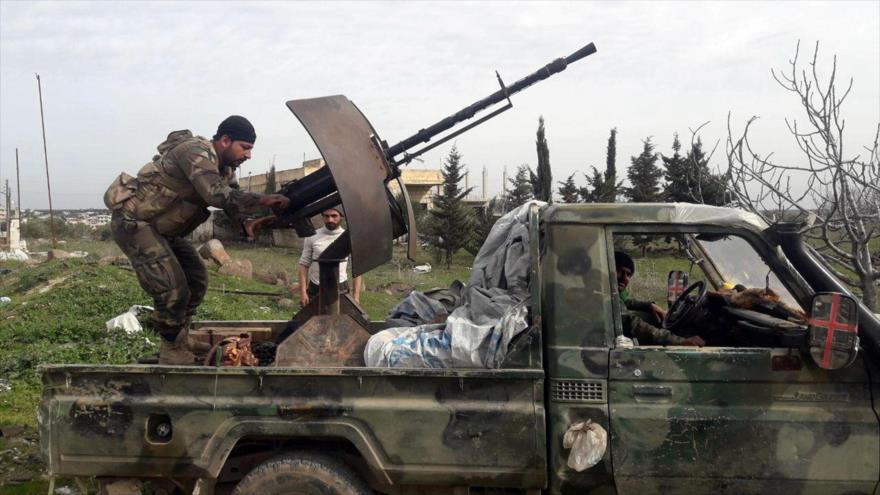 Soldados del Ejército sirio en un vehículo militar en la provincia de Idlib (noroeste de Siria). (Foto: SANA)