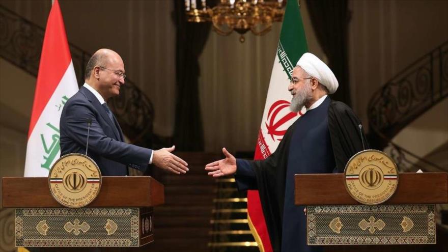 El presidente iraní, Hasan Rohani (dcha.), y su homólogo iraquí, Barham Salih, en una rueda de prensa en Teherán, 17 de noviembre de 2018. (Foto: IRNA)