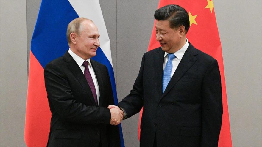 El presidente ruso, Vladimir Putin, y su par chino, Xi Jinping, en una cumbre de BRICS en Brasilia, 13 de noviembre de 2019. (Foto: Reuters)