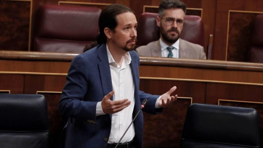 El vicepresidente segundo del Gobierno de coalición de España y líder de Podemos, Pablo Iglesias, interviene ante el Parlamento nacional. 
