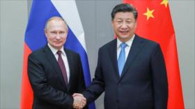 China y Rusia limitan dólar en negocios en una alianza financiera