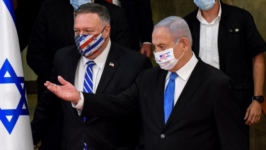 El secretario de Estado de EE.UU., Mike Pompeo (izq.), y el premier israelí, Benjamín Netanyahu, Al-Quds (Jerusalén), 24 de agosto de 2020. (Foto: AFP)