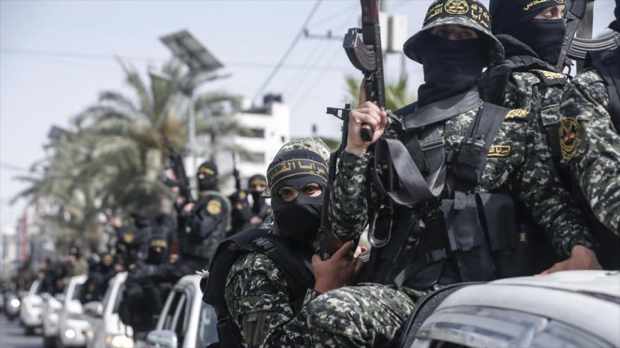 Miembros del movimiento Yihad Islámica Palestina durante un funeral simbólico en la ciudad de Gaza, 7 de junio de 2020. (Foto: AFP)