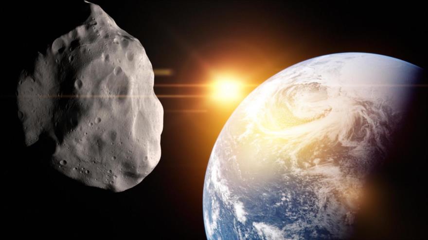 Imagen representativa de un asteroide acercándose a la Tierra.