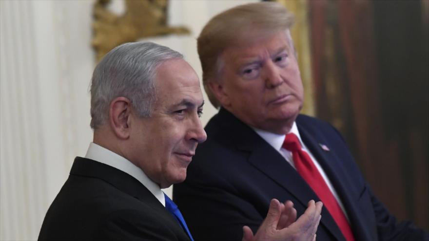 El presidente de EE.UU., Donald Trump (dcha.), y el premier israelí, Benjamín Netanyahu, en un acto en Washington, 28 de enero de 2020. (Foto: AP)