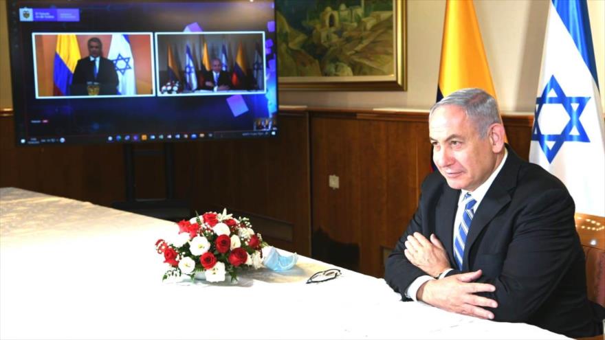 El presidente colombiano, Iván Duque, en videoconferencia conjunta con el primer ministro israelí, Benjamín Netanyahu, 10 agosto de 2020.