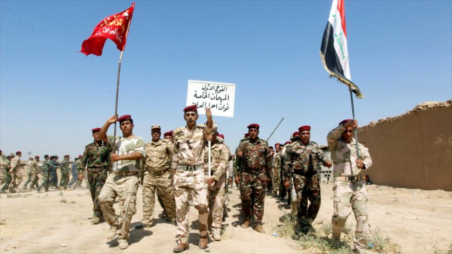 Miembros de las Al-Hashad Al-Shabi de Irak durante un desfile militar cerca de la provincia norteña de Kirkuk. (Foto: Reuters)