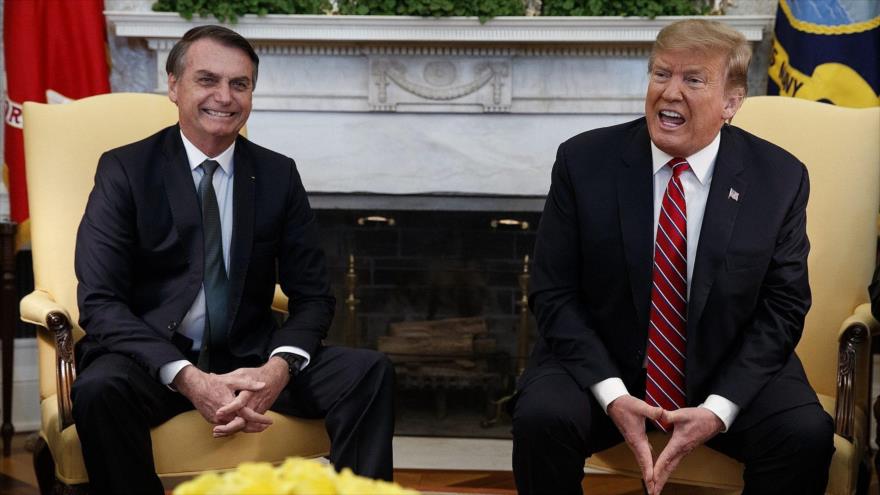 El presidente de EE.UU., Donald Trump (decha.), y el presidente de Brasil, Jair Bolsonaro, en la Casa Blanca, EE.UU., 19 de marzo de 2019.