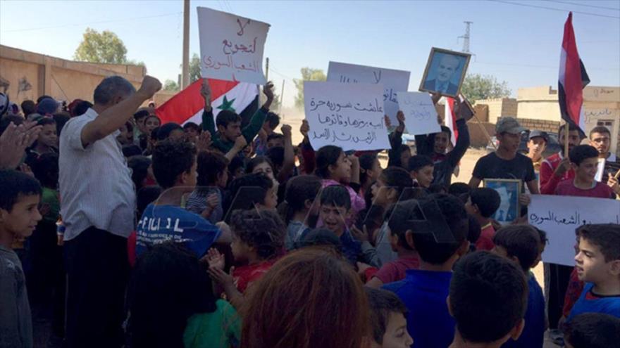 Sirios protestan contra la ocupación de su país por EE.UU. y Turquía, Qamishli, provincia Al-Hasaka, 18 de septiembre de 2020. (Foto: SANA)