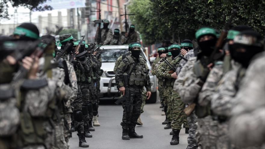 Miembros de las Brigadas de Ezzedin Al-Qassam, brazo militar de HAMAS, en un desfile en la Franja de Gaza, 5 de diciembre de 2017. (Foto: AFP)