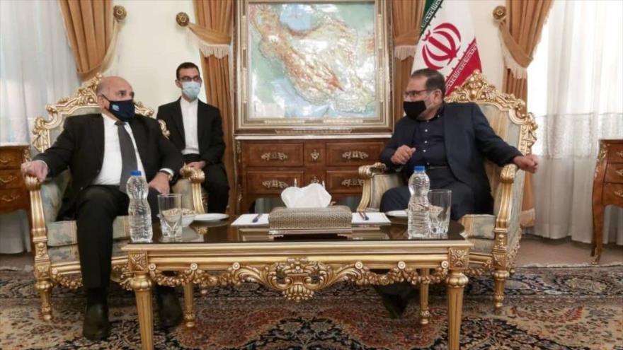 El secretario del Consejo Supremo de Seguridad Nacional, Ali Shamjani (dcha.), se reúne con el canciller iraquí, Foad Husein, 27 de septiembre de 2020.