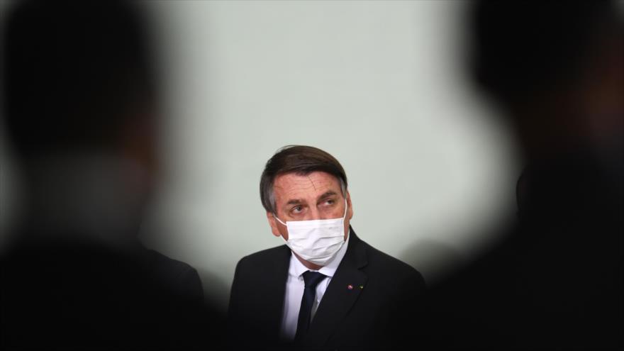 El presidente brasileño, Jair Bolsonaro, asiste a una reunión en Brasilia, la capital, 25 de agosto de 2020. (Foto: AFP)