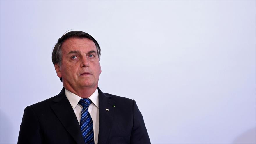 El presidente brasileño, Jair Bolsonaro, durante un acto en el Palacio Planalto, en Brasilia (capital), 14 de octubre de 2020. (Foto:AFP)