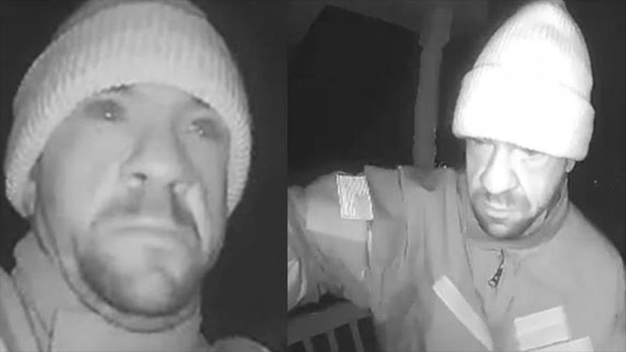 Imágenes capturadas del vídeo que muestran a James Dale Reed dejando una carta amenazante el 4 de octubre en una residencia en el condado de Frederick, Maryland.