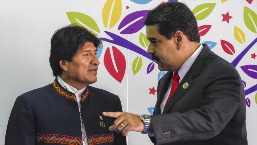 El expresidente boliviano Evo Morales (izda.) y el presidente venezolano Nicolás Maduro, isla Margarita (Venezuela), 17 de septiembre de 2016. (Foto: AFP)