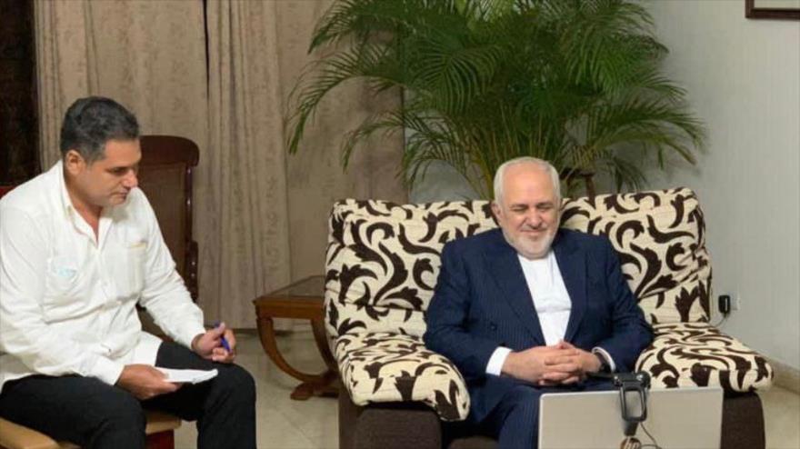 El canciller iraní, Mohamad Yavad Zarif, mantiene una reunión a través de videoconferencia con el presidente cubano, Miguel Díaz-Canel, 7 de noviembre de 2020. (Foto: mfa.gov.ir)