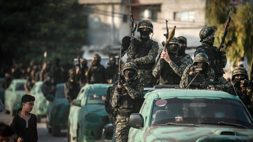 Combatientes del movimiento de la Yihad Islámica Palestina participan en un mitin militar en la ciudad de Gaza, 12 de noviembre de 2020. (Foto: AFP)