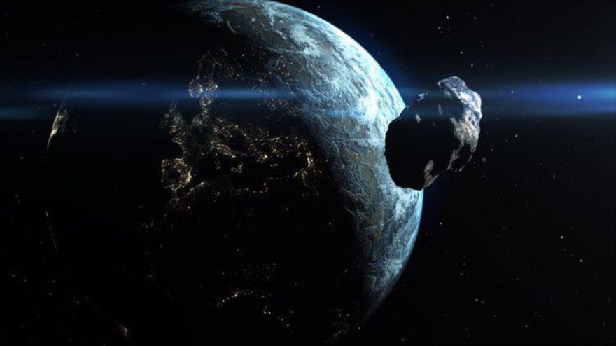 
Imagen representativa de un asteroide acercándose a la Tierra.
