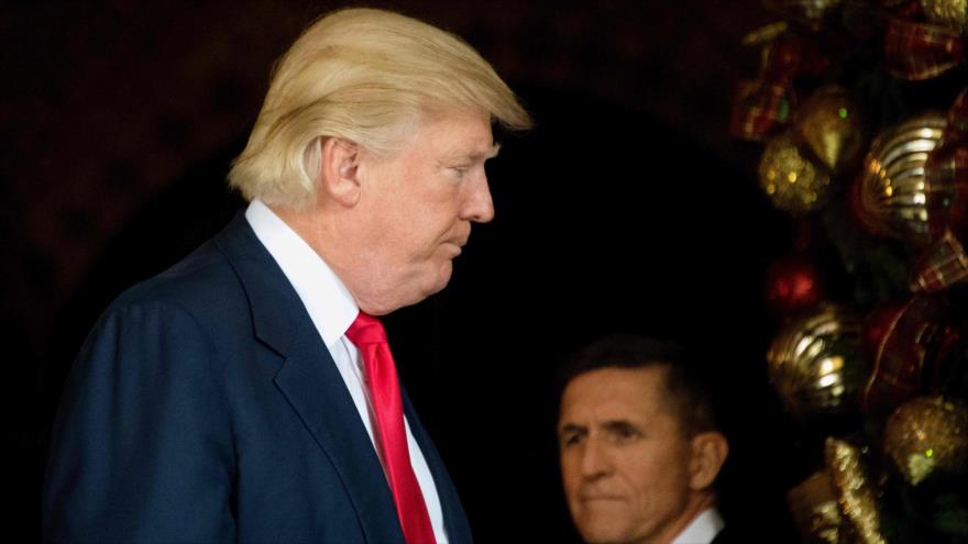 El presidente de EE.UU., Donald Trump (izda.), y su exasesor de Seguridad Nacional Michael Flynn, en Florida, 21 de diciembre de 2016. (Foto: AFP)