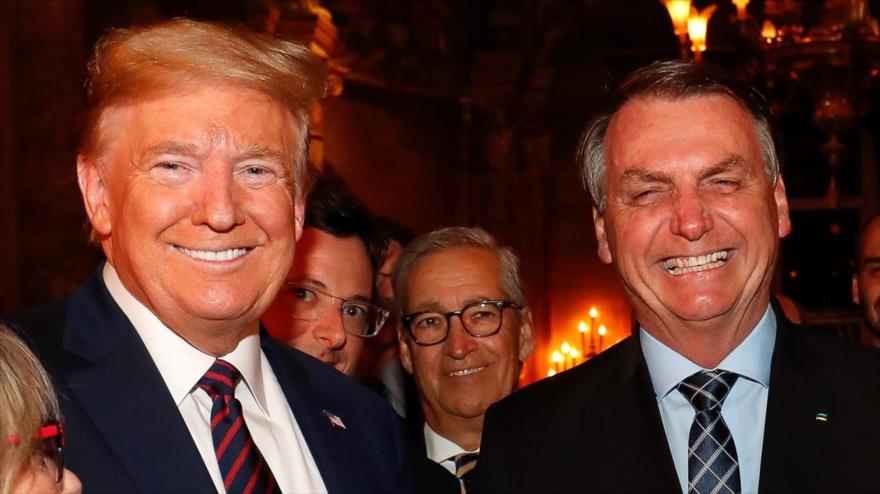 El presidente de Estados Unidos, Donald Trump (izda.) y su par brasileño, Jair Bolsonaro, (dcha.) en Mar a Lago, Florida, EE.UU., (7 de marzo de 2020). (Foto: AFP)