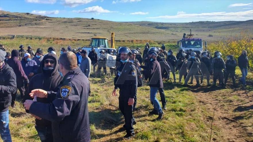 Las fuerzas israelíes intentan detener una huelga general en el Golán ocupado en Siria, 9 de diciembre de 2020. (Foto: SANA)