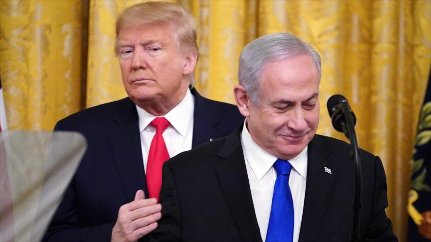 El presidente de EE.UU., Donald Trump (izda.), y el premier israelí, Benjamín Netanyahu, en la Casa Blanca, 28 de enero de 2020. (Foto: AFP)