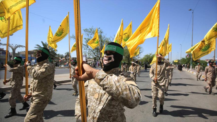 Combatientes del Movimiento Hezbolá al-Nuyaba marchan durante un desfile militar en Bagdad, capital iraquí, 31 de mayo de 2019. (Foto: AFP)