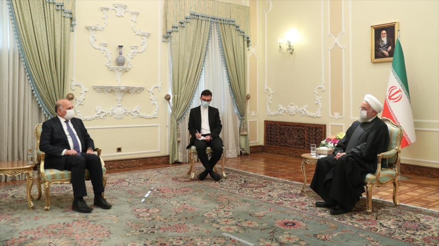 El presidente iraní, Hasan Rohani (dcha.), en una reunión con el canciller iraquí, Foad Hosein, en Teherán, 3 de febrero de 2021. (Foto: president.ir)