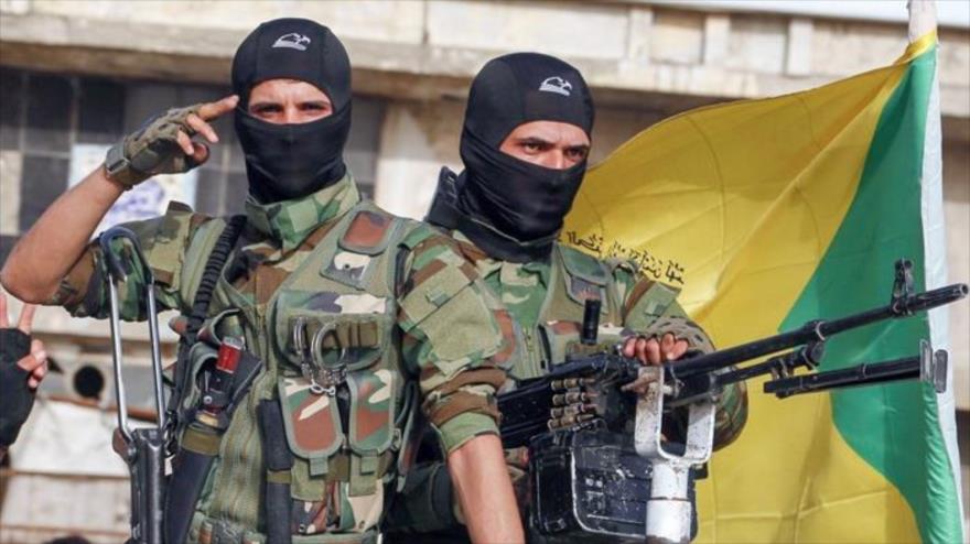 Combatientes del Movimiento de Resistencia Islámica de Irak (Kataeb Hezbolá).