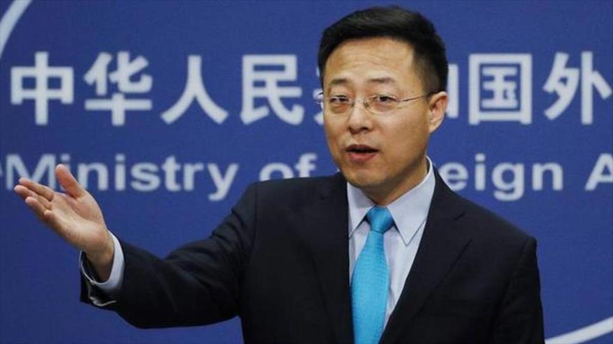 
El portavoz del Ministerio de Relaciones Exteriores de China, Zhao Lijian, habla en su conferencia de prensa en Pekín el 29 de marzo de 2021.
