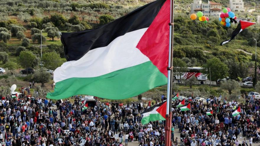 Los palestinos conmemoran el 45.º aniversario del Día de la Tierra Palestina, 30 de marzo de 2021. (Foto: WAFA)