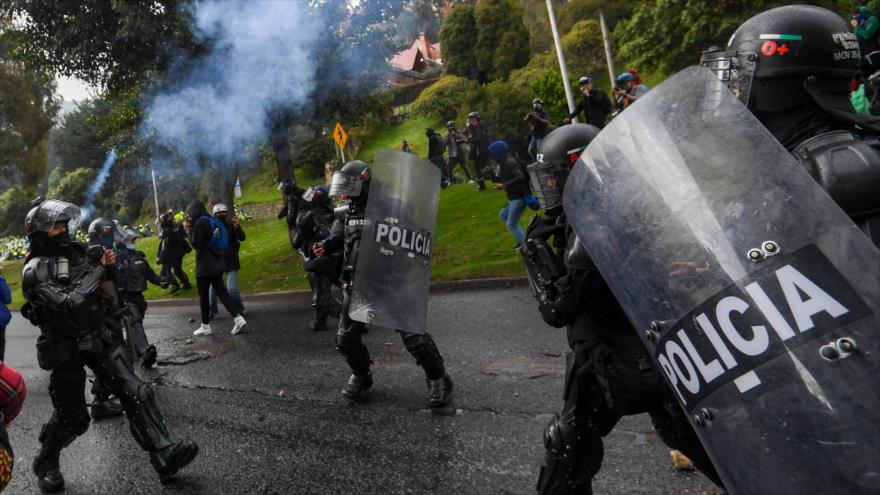 Policía de Colombia dispara a agentes de ONU en protestas sociales | HISPANTV