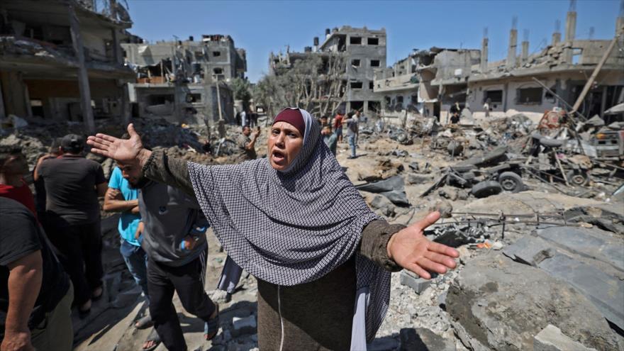 Los palestinos evalúan los daños causados por los ataques aéreos israelíes en Beit Hanun, norte de la Franja de Gaza, 14 de mayo de 2021. (Foto: AFP)