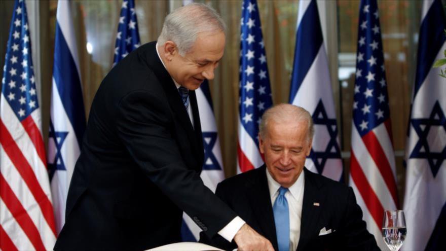 El ministro israelí, Benjamín Netanyahu (izq.), y el presidente electo de Estados Unidos, Joe Biden.
