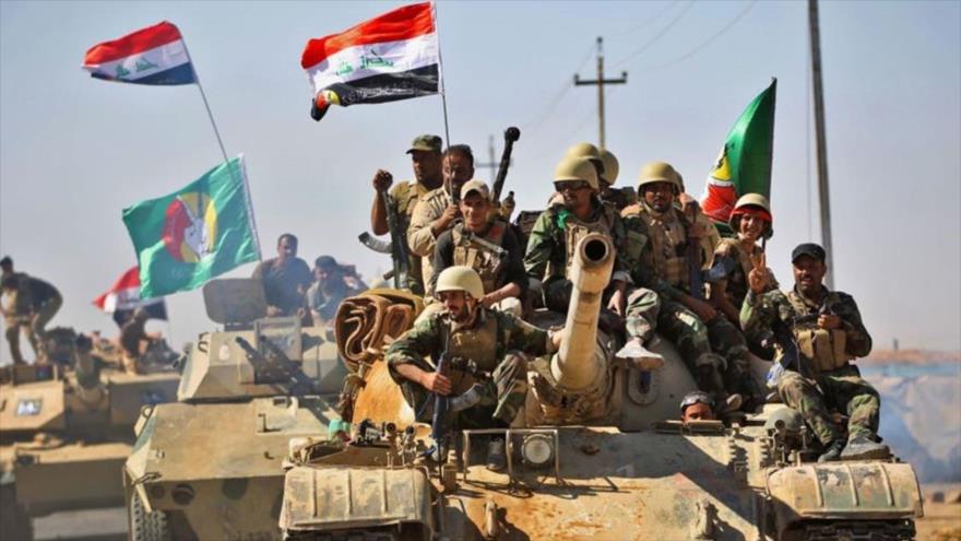 Combatientes de las Unidades de Movilización Popular de Irak, durante una operación antiterrorista. 