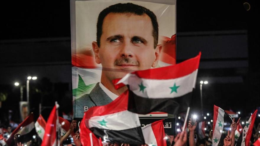 Sirios festejan victoria de Al-Asad en las presidenciales