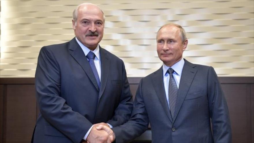 El presidente ruso, Vladimir Putin, y su homólogo bielorruso, Alexander Lukashenko.
