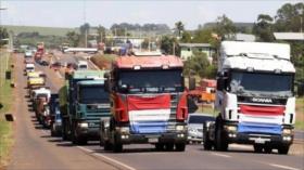 Indignados camioneros paraguayos amenazan con “sitiar” la capital