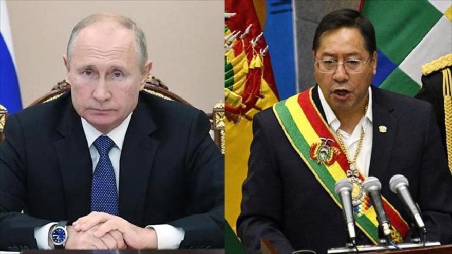 El presidente de Rusia, Vladimir Putin, y su homólogo de Bolivia, Luis Arce (dercha.).