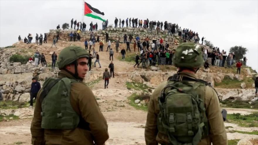 Soldados israelíes durante una protesta de los palestinos contra los asentamientos ilegales en la ciudad de Beita, en la ocupada Cisjordania.