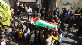 Palestinos participan en funeral de jóvenes asesinados por Israel