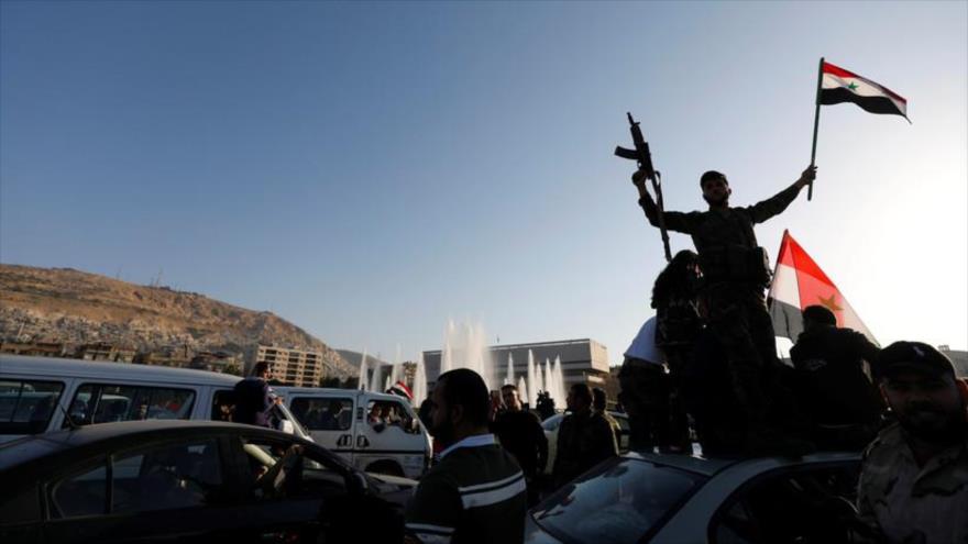 Los sirios protestan en Damasco (la capital) contra las injerencias de EE.UU. y sus aliados en el país. (Foto: Reuters)