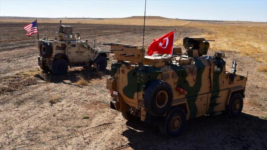 Vehículos militares pertenecientes a fuerzas estadounidenses y turcas durante una patrulla conjunta en Siria, septiembre de 2019. (Foto: Reuters)