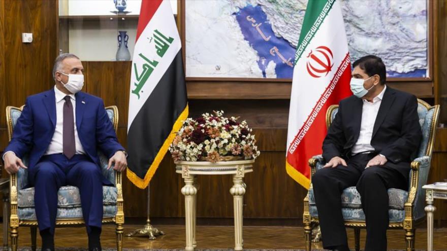 El primer vicepresidente iraní, Mohamad Mojber, y el premier iraquí, Mustafa al-Kazemi, se reúnen en Teherán, capital persa, 12 de septiembre de 2021.