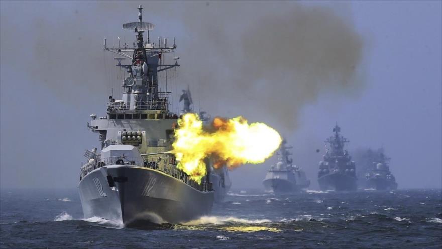 Buques de la Armada china participan en unas maniobras militares en el norte del estrecho de Taiwán, mayo de 2019.
