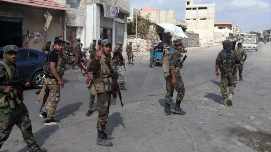 Unidades de Ejército sirio tras operaciones de peinado y despliegue en Nawa, en provincia de Daraa (suroeste), 3 de octubre de 2021. (Foto: SANA)