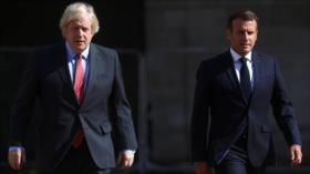 Informe: Presidente francés llamó “payaso” al premier británico