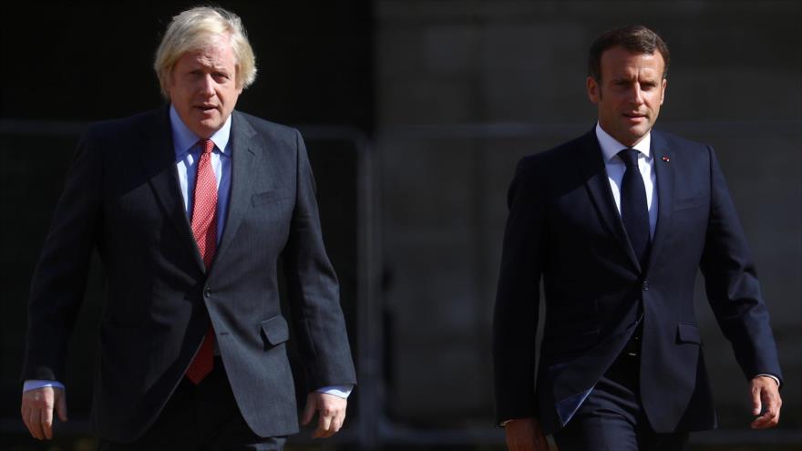 El premier británico, Boris Johnson, (izda.) y el presidente francés, Emmanuel Macron, en Londres, el Reino Unido. (Foto: Reuters)